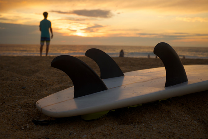 Surfboard on the beach sand