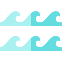 little blue wave behind surfboard